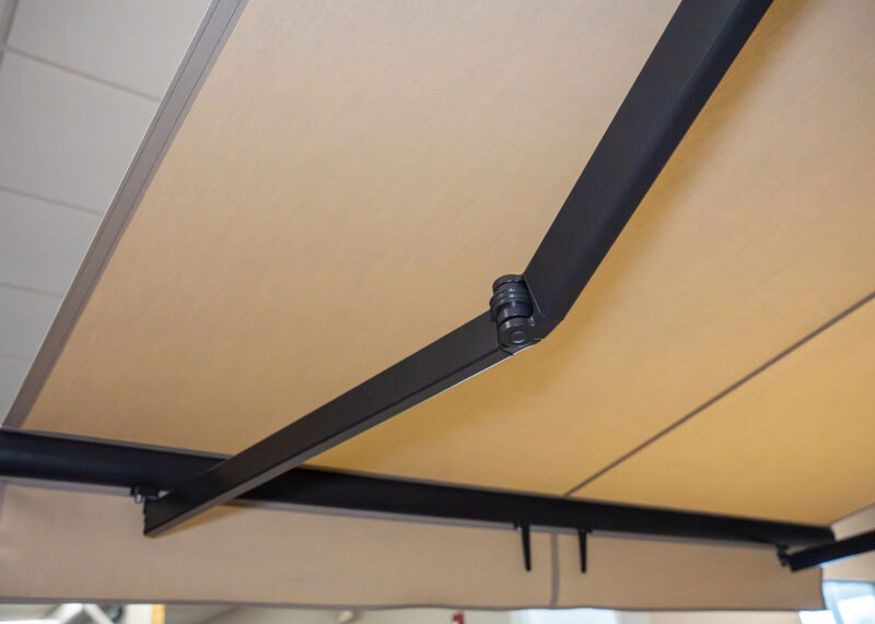 Cross-Arm Motorized Awning