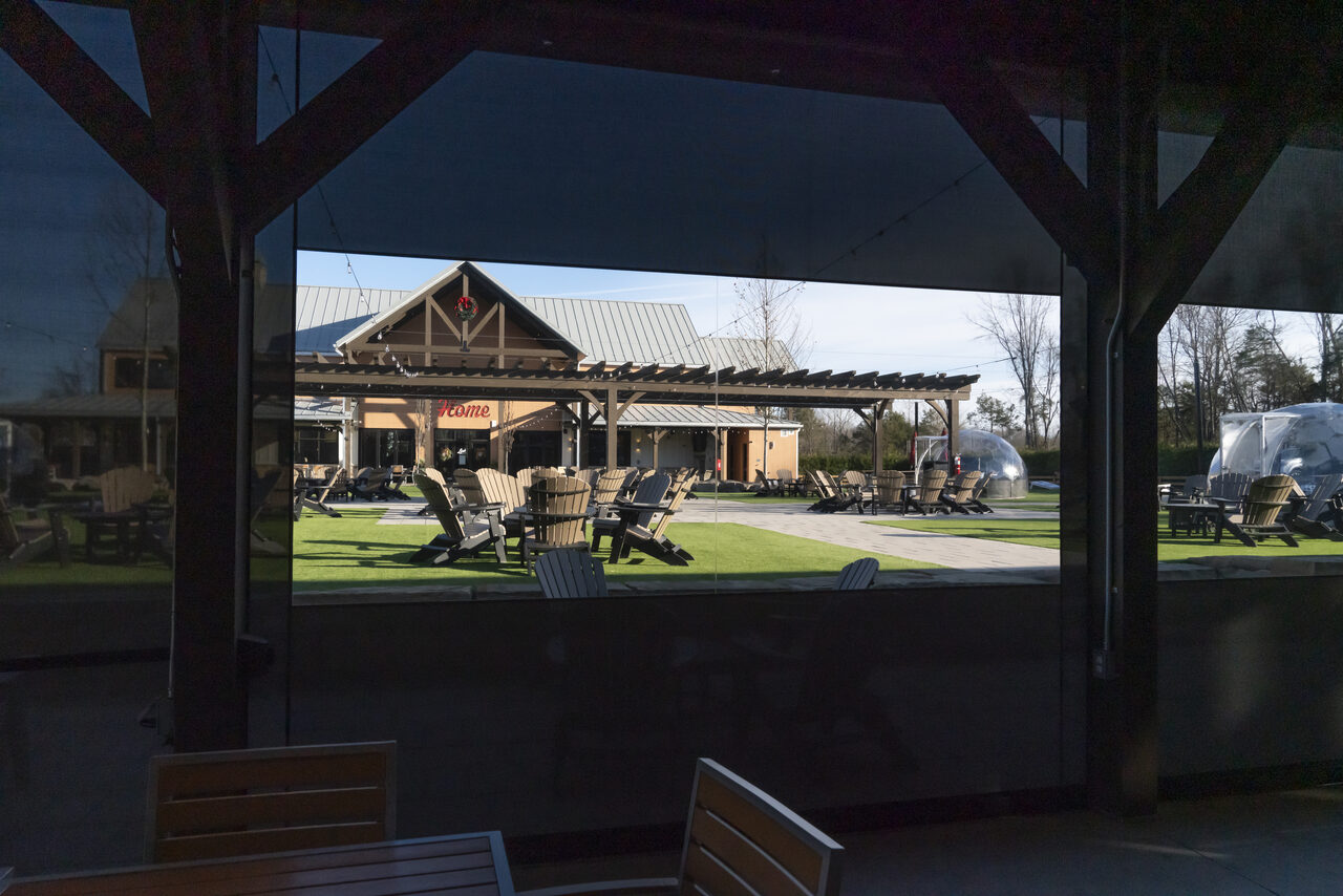 Motorized screens on an outdoor living space